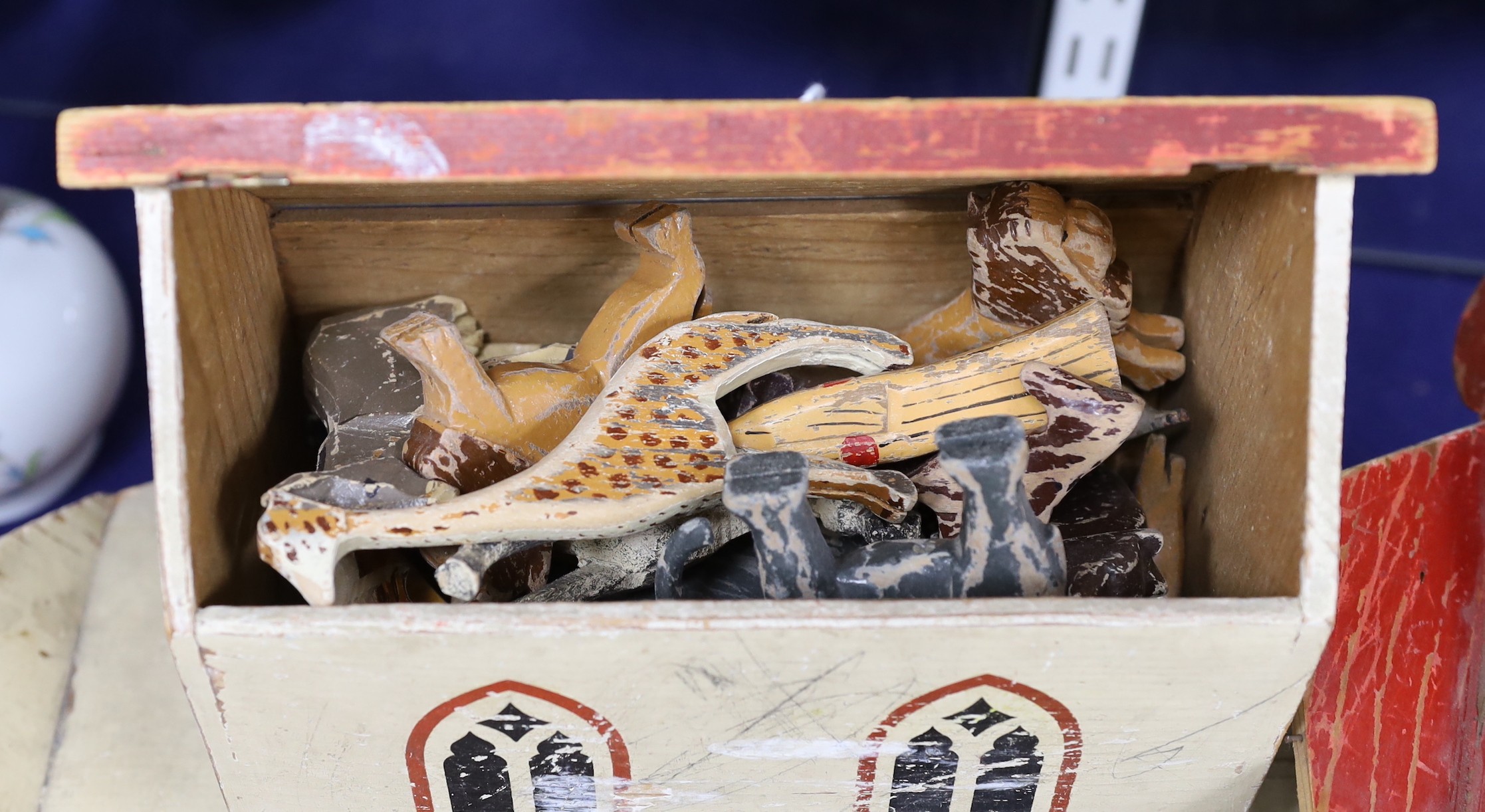 A War Relief Toy Works painted wood Noah's ark, a painted wood toy zoo cage and a quantity of animals